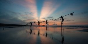 fiskere i solnedgang