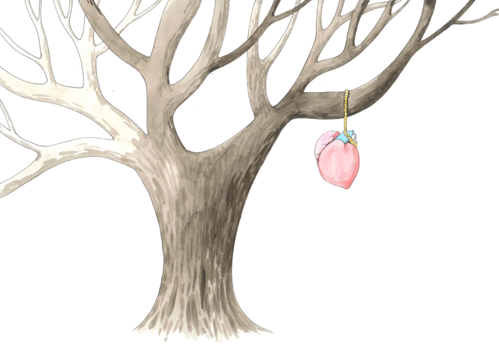 Et hjerte henger fra ett tre i en tråd. 