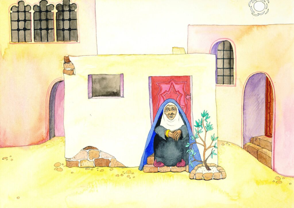 en dame sitter foran et hus